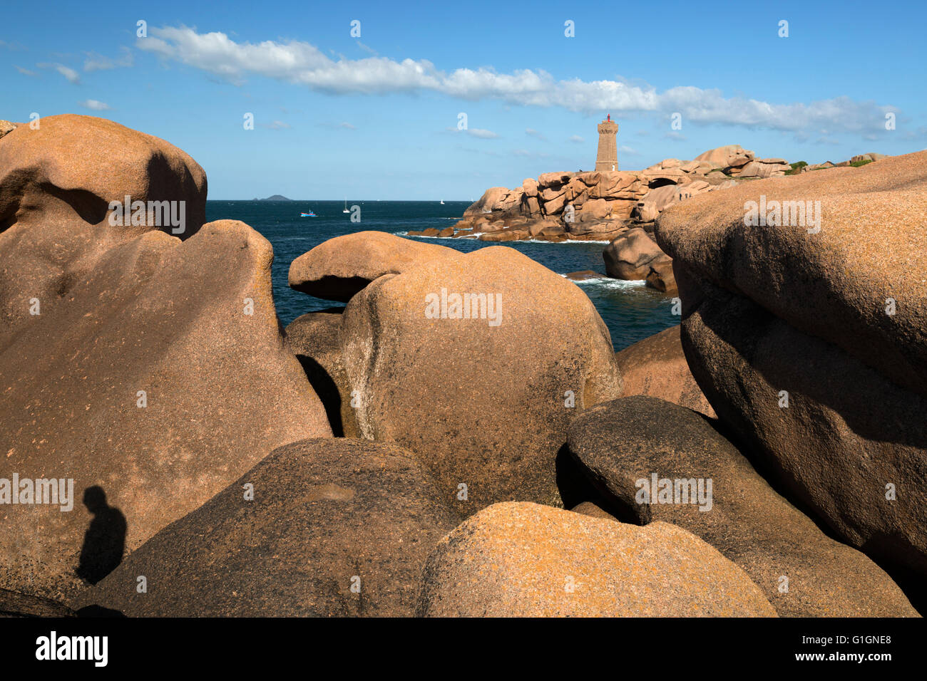 Lighthouse and pink rocks, Ploumanach, Cote de Granit Rose, Cotes d'Armor, Brittany, France, Europe Stock Photo