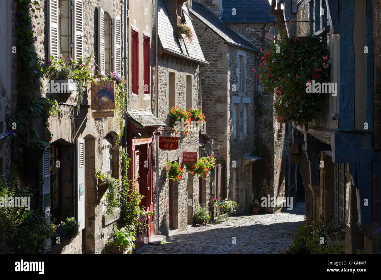 Cobbled street and typical Breton stone houses, Rue du Petit Four, Dinan, Cotes d'Armor, Brittany, France, Europe Stock Photo
