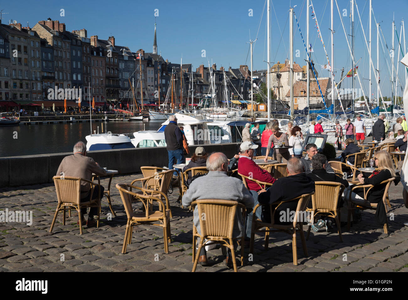 Outdoor cafe on Saint Etienne Quay in Vieux Bassin, Honfleur, Normandy, France, Europe Stock Photo