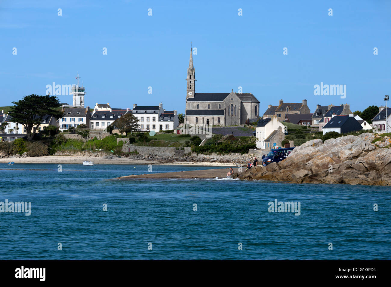 View of port and church, Ile de Batz, near Roscoff, Finistere, Brittany, France, Europe Stock Photo