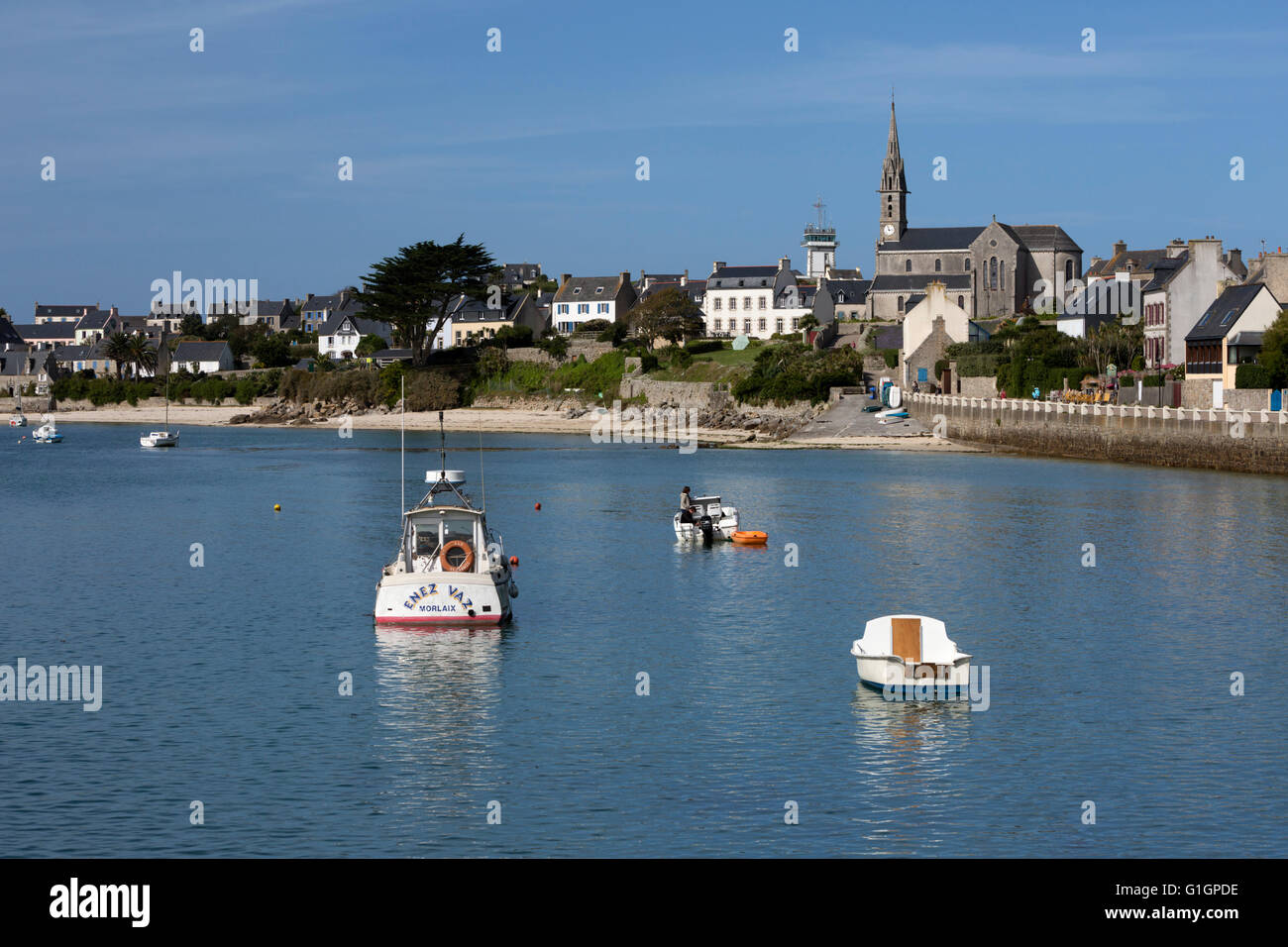 View of port and church, Ile de Batz, near Roscoff, Finistere, Brittany, France, Europe Stock Photo