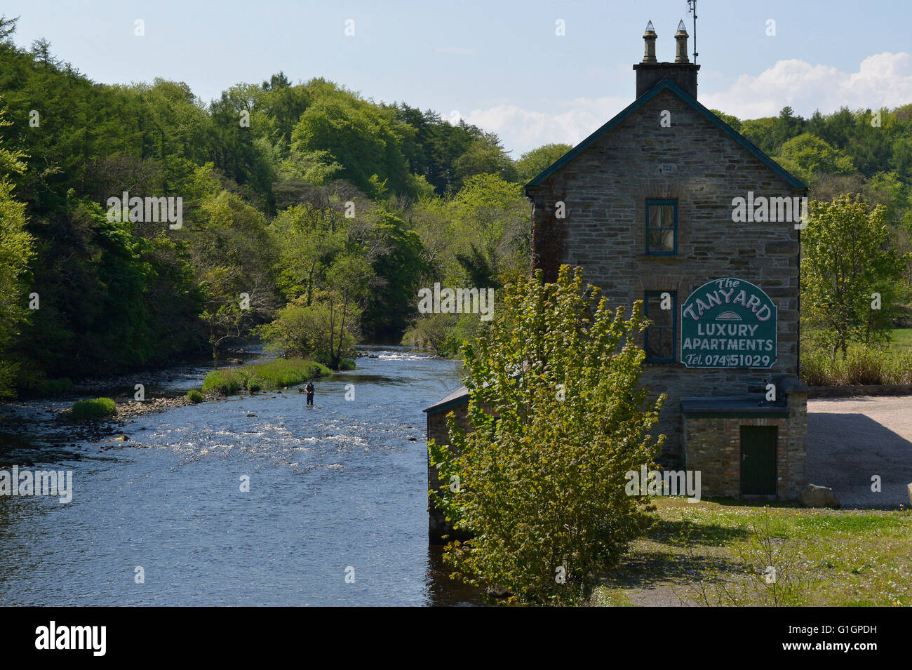 Old mill converted into apartments beside the River Lennon, County Donegal, Ireland. Stock Photo