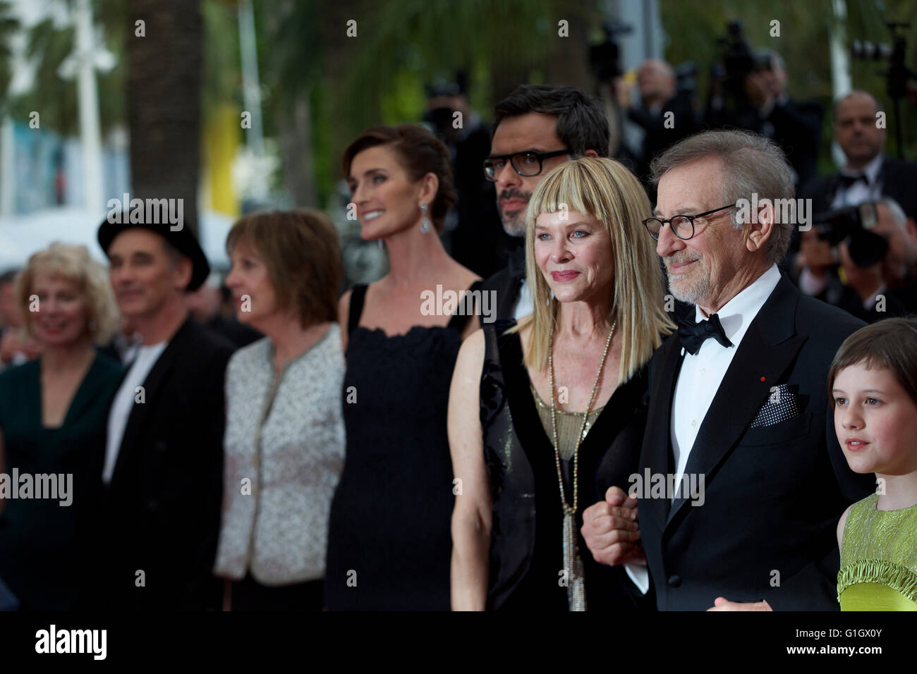 (160515) -- CANNES, May 15, 2016 (Xinhua) -- Director Steven Spielberg (2nd R), his wife Kate Capshaw (3rd R) and cast member Ruby Barnhill (1st R) pose on the red carpet as they arrive for the screening of the film 'The BFG' at the 69th Cannes Film Festival in Cannes, France, May 14, 2016.(Xinhua/Jin Yu) Stock Photo