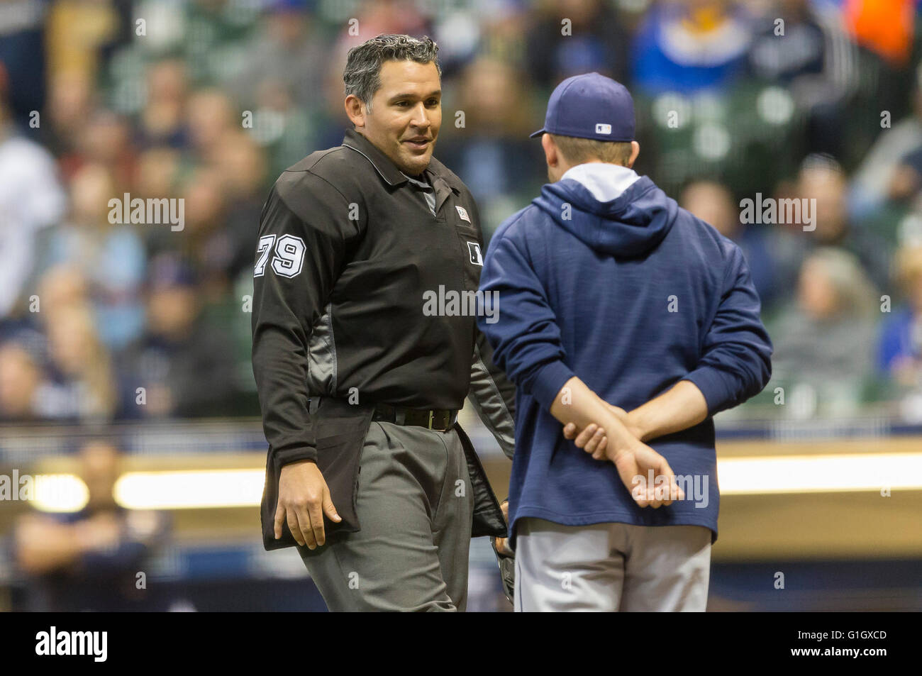 May 14, 2016: Home Plate Umpire Manny Gonzalez tells San Diego Padres manager Andy Green #14 the play at first is reverse and the Brewer runner is safe during the Major League Baseball game between the Milwaukee Brewers and the San Diego Padres at Miller Park in Milwaukee, WI. John Fisher/CSM Stock Photo