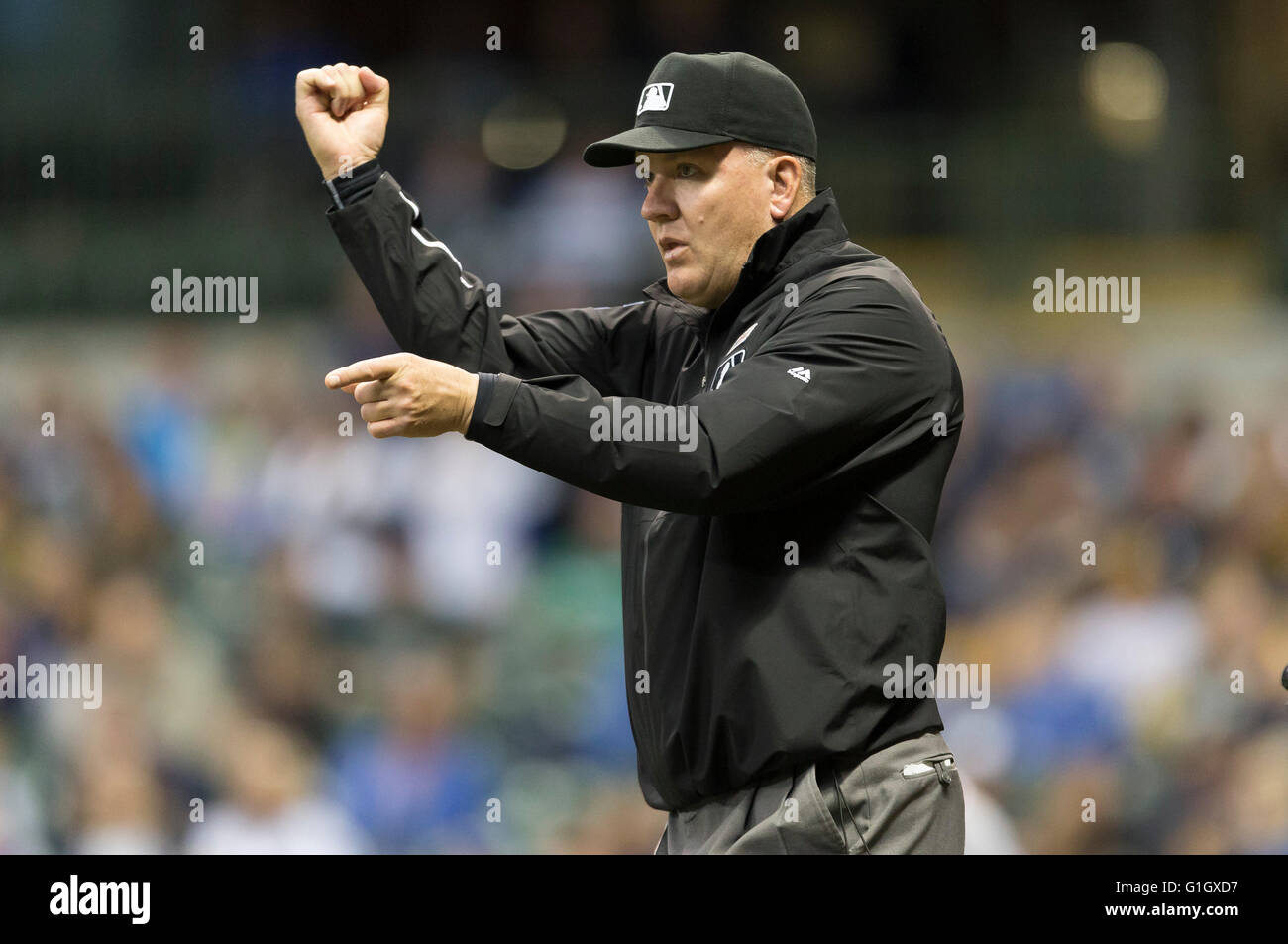 May 14, 2016: Umpire Jeff Nelson confirms the replay that the runner was out at third base during the Major League Baseball game between the Milwaukee Brewers and the San Diego Padres at Miller Park in Milwaukee, WI. John Fisher/CSM Stock Photo