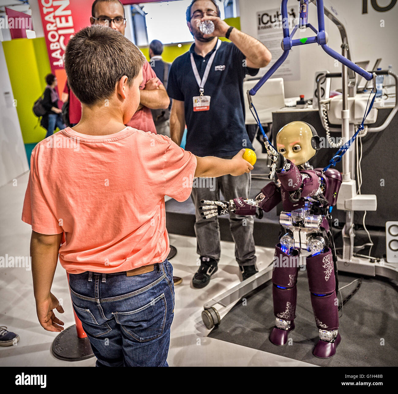 Turin, Italy. 15th May, 2016. XXIX International Book Fair -Children interact with the robot Icub Credit:  Realy Easy Star/Alamy Live News Stock Photo