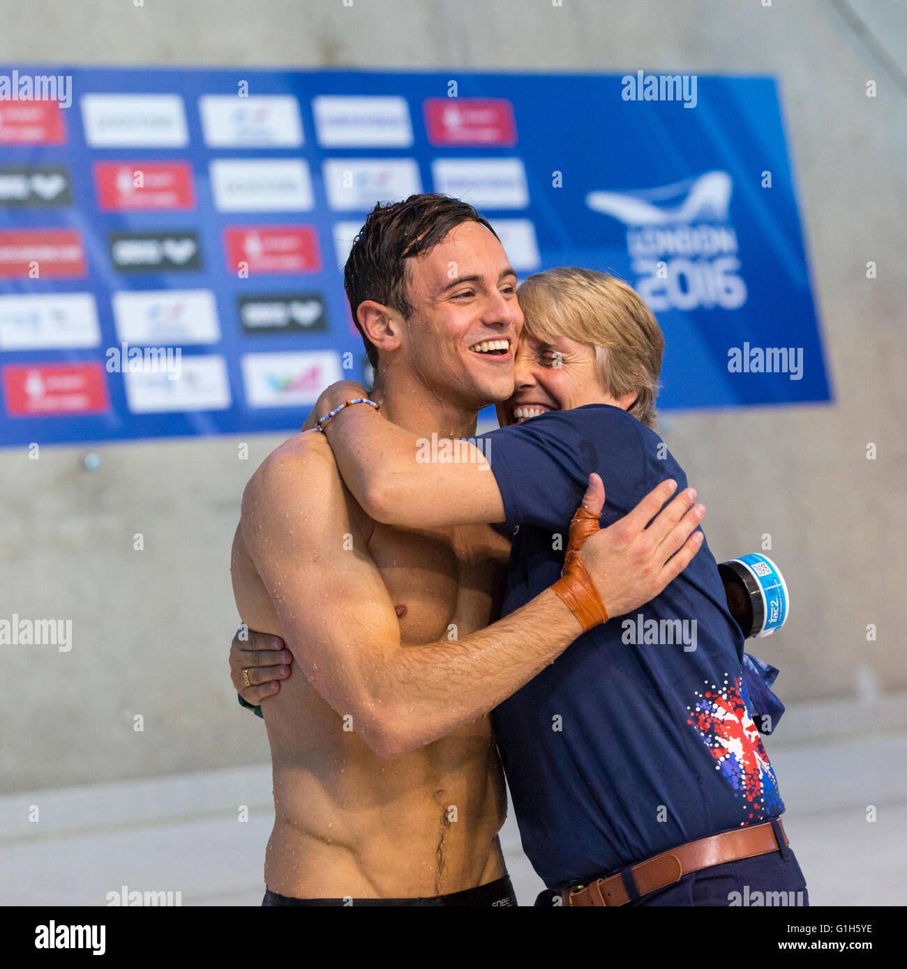 British diver Tom Daley (Thomas Daley) smiles,celebrates winning gold with coach Jane Figueiredo at the European Diving Championships 2016, London, UK Stock Photo