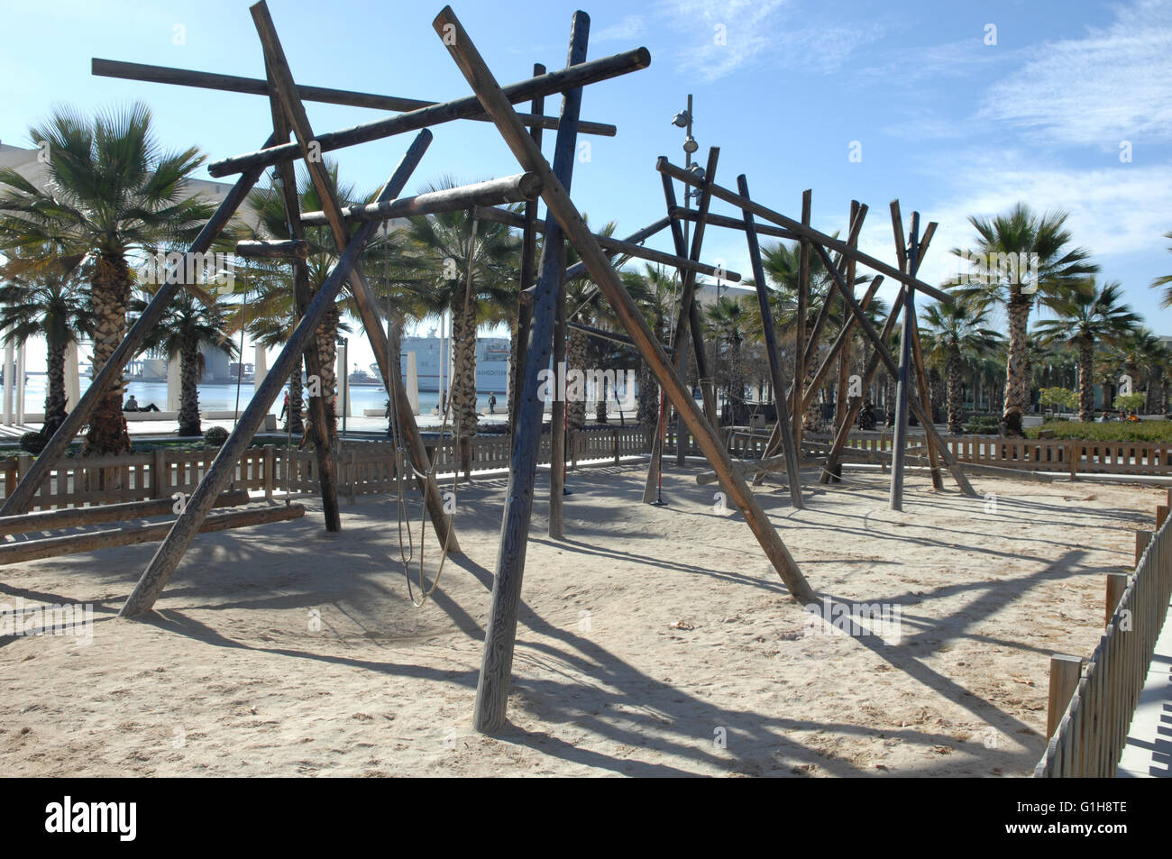Playground next to Malaga marina for kids to play in - Malaga, Spain Stock Photo