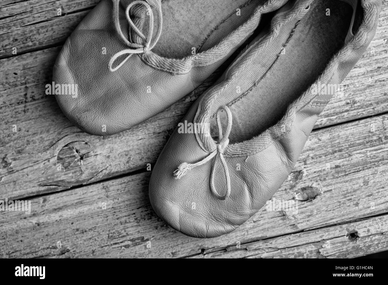 Worn Ballet Shoes on black and white Stock Photo - Alamy