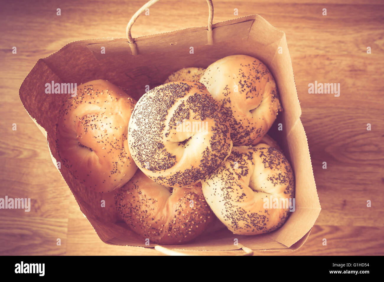 Variety of New York style bagels in brown paper bag Stock Photo Alamy