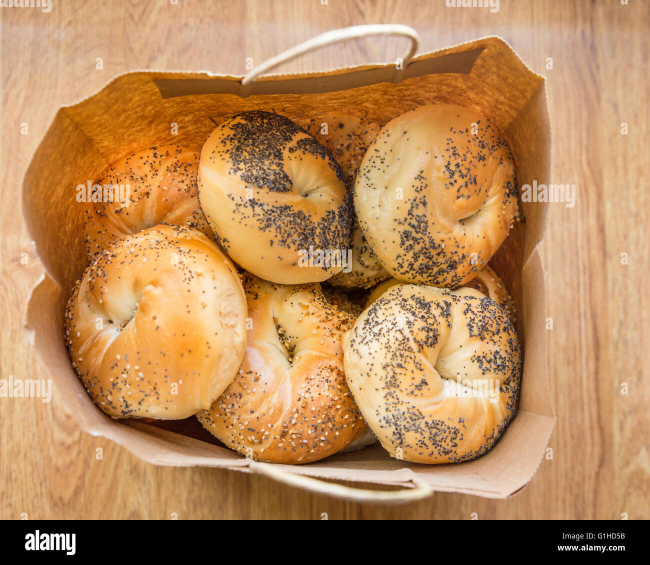 Variety of New York style bagels in brown paper bag Stock Photo Alamy