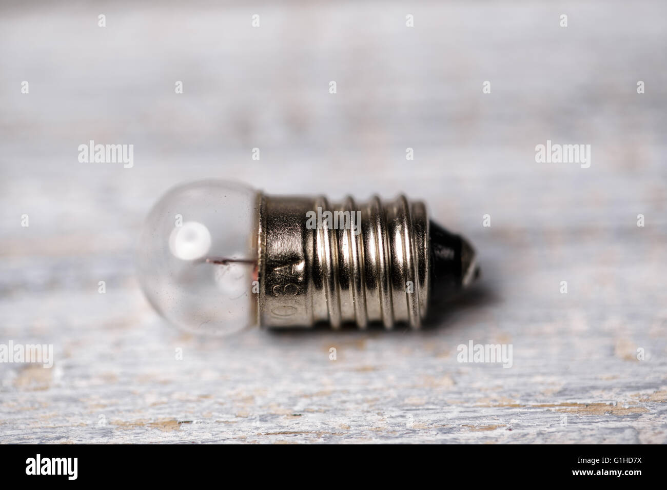 Close up of small conventional light bulb Stock Photo