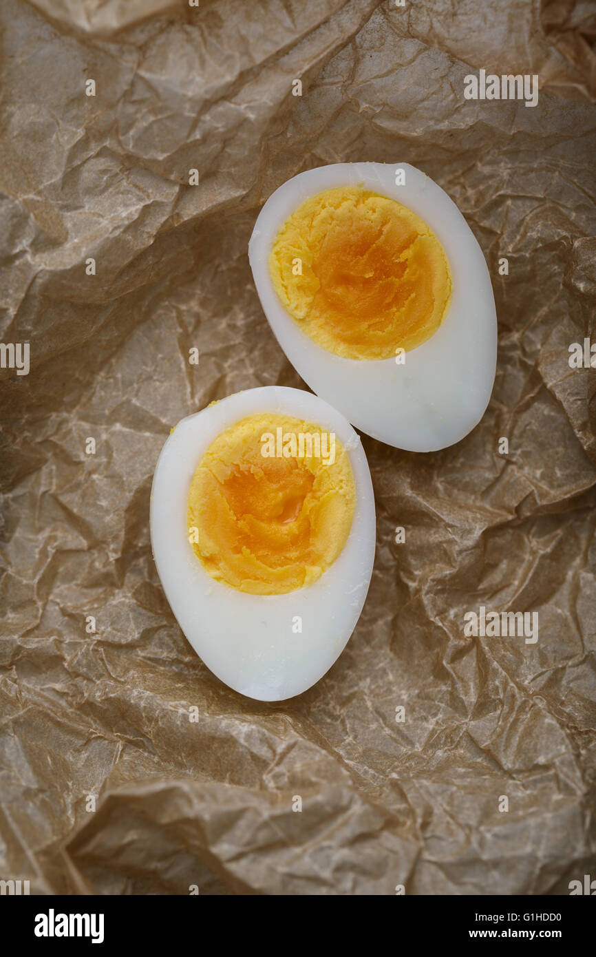 Fresh Quail Eggs cooked and cut in Half Stock Photo