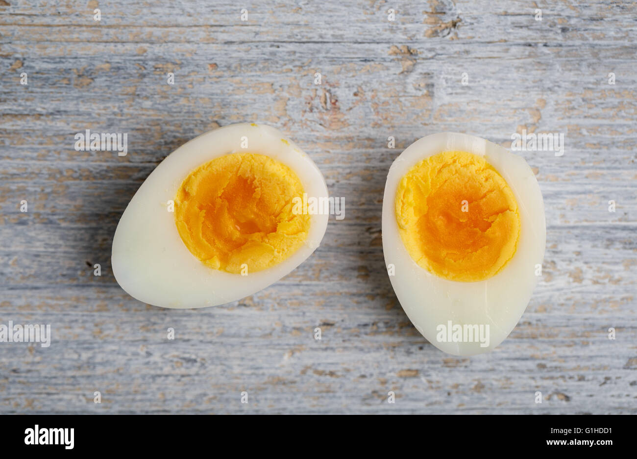 Fresh Quail Eggs cooked and cut in Half Stock Photo