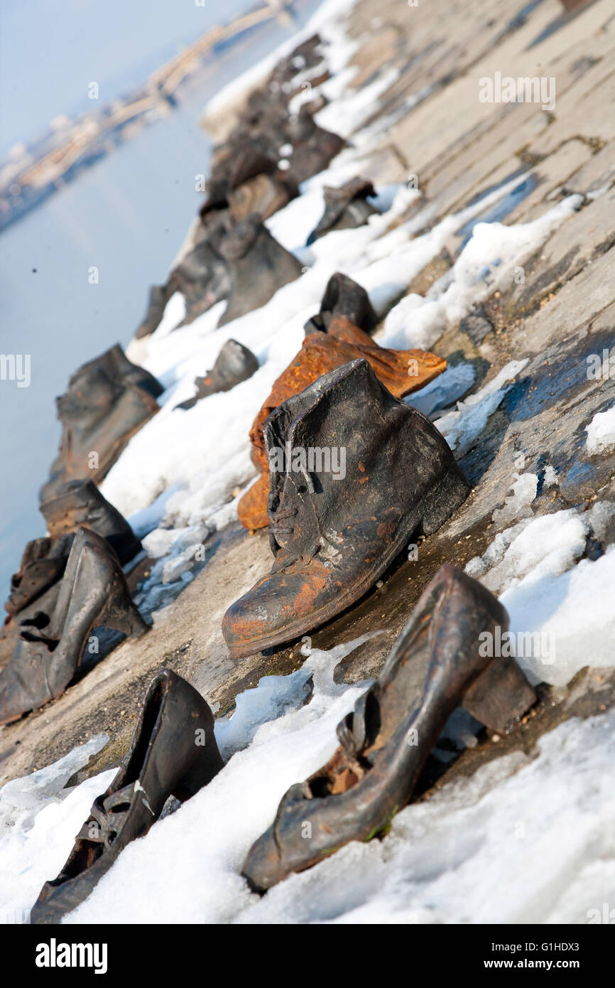 The Shoes on the Danube Bank memorial in the snow in Budepest, Hugary. Stock Photo