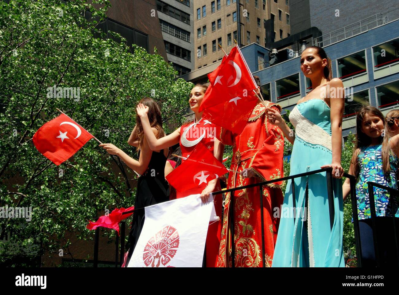 New York City Women and children waving Turkish flags riding a float