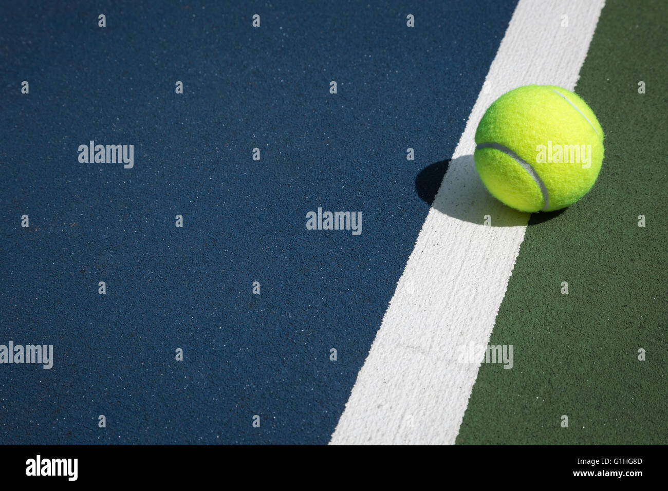 Tennis ball on the court Stock Photo
