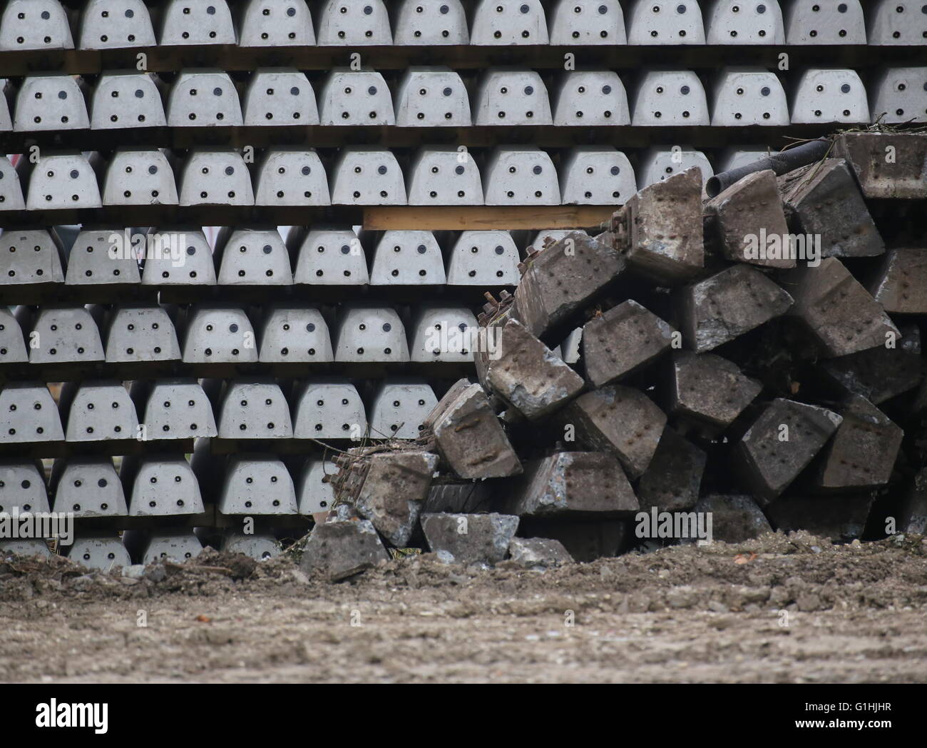 Old and new concrete railroad ties waiting for installation Stock Photo