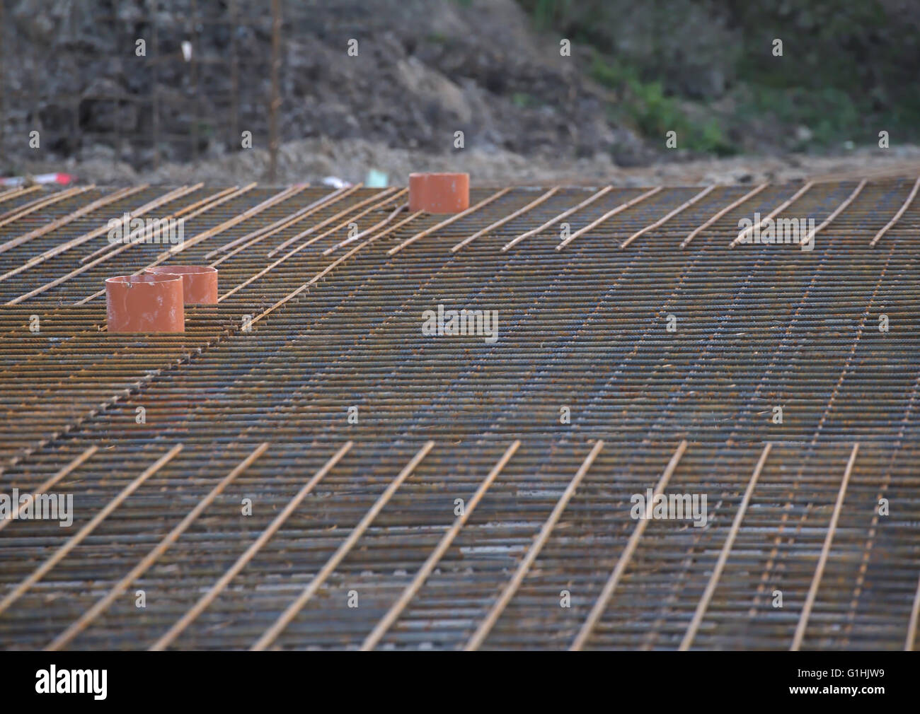 Steel frame for the construction of a reinforced concrete foundation. Stock Photo