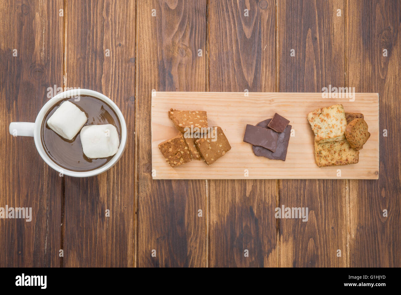 homemade hot chocolate and marshmallow on wooden table, winter afternoon Stock Photo