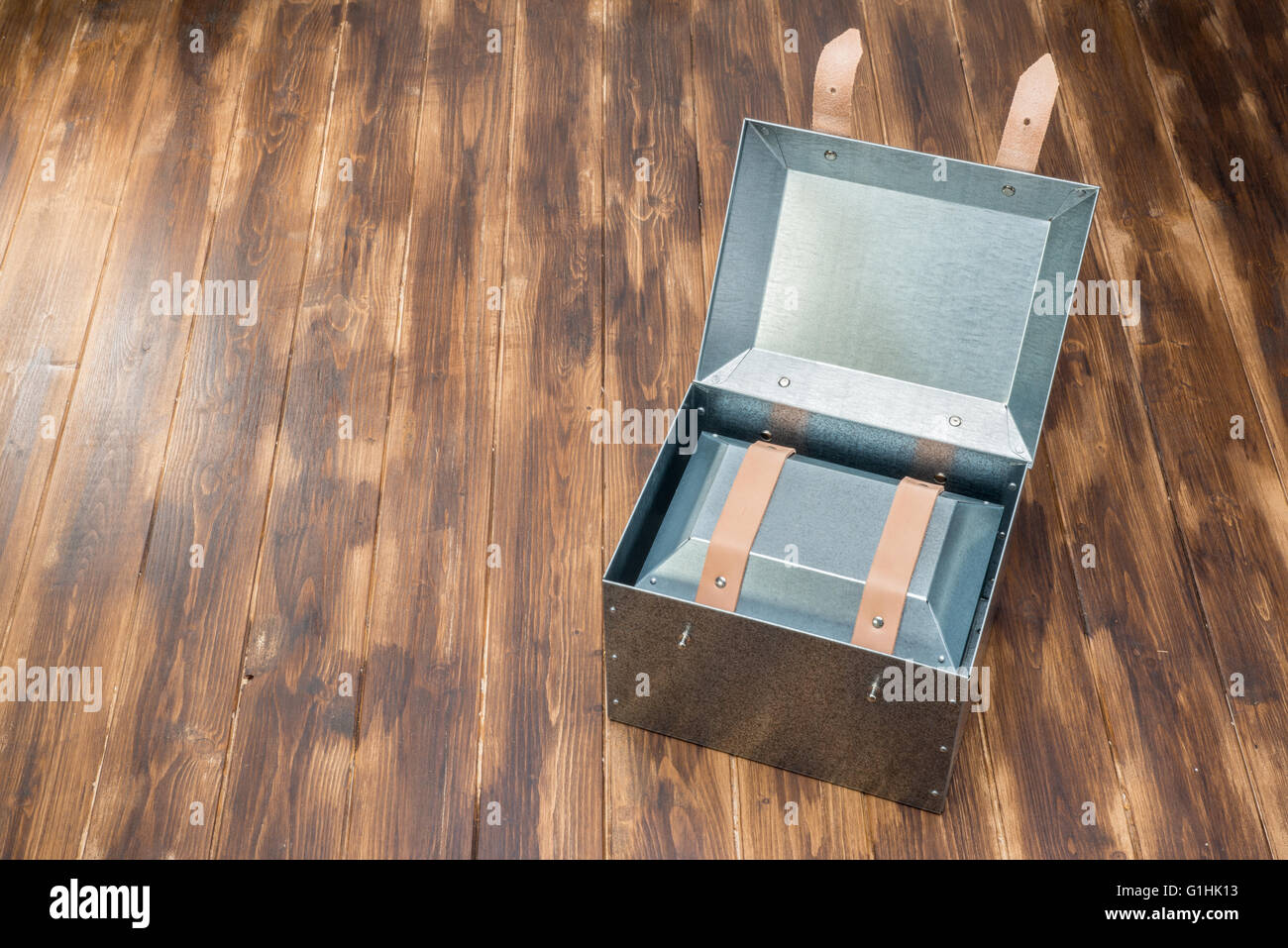 metal box in side of metal box on wooden table, Studio Shot Stock Photo ...