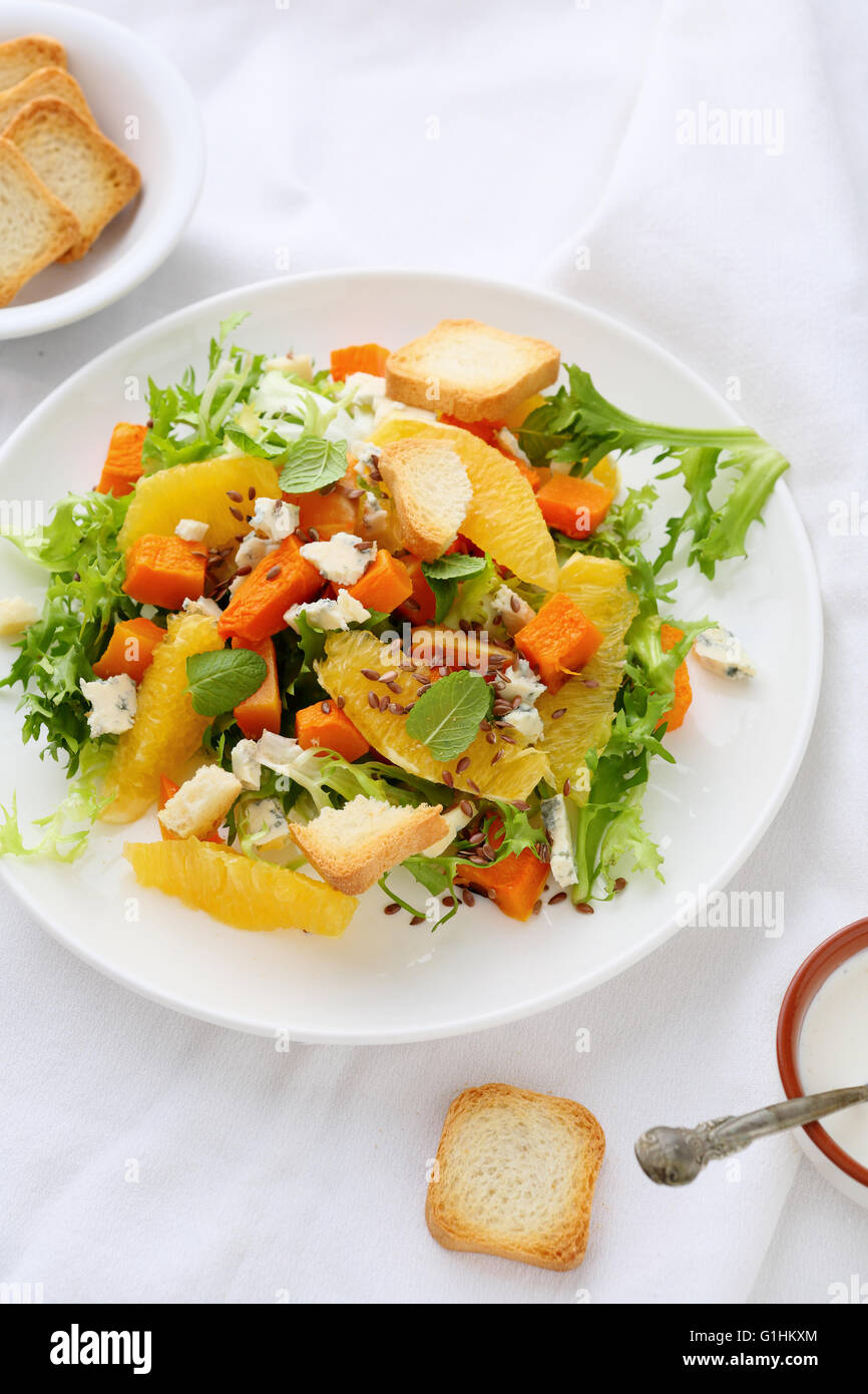 baked pumpkin salad with cheese on plate Stock Photo