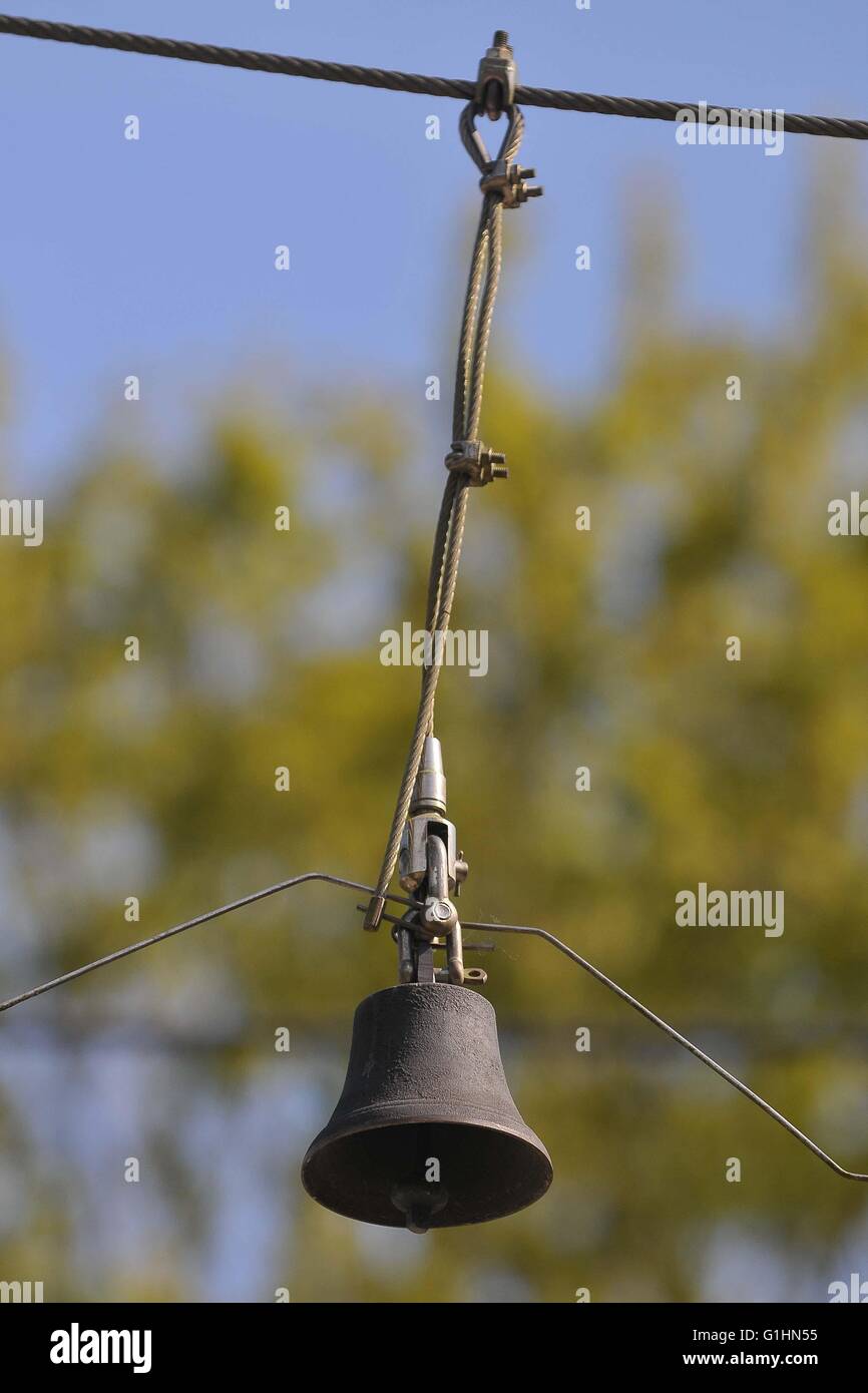 level crossing warning bell in focus background blurred Stock Photo Alamy