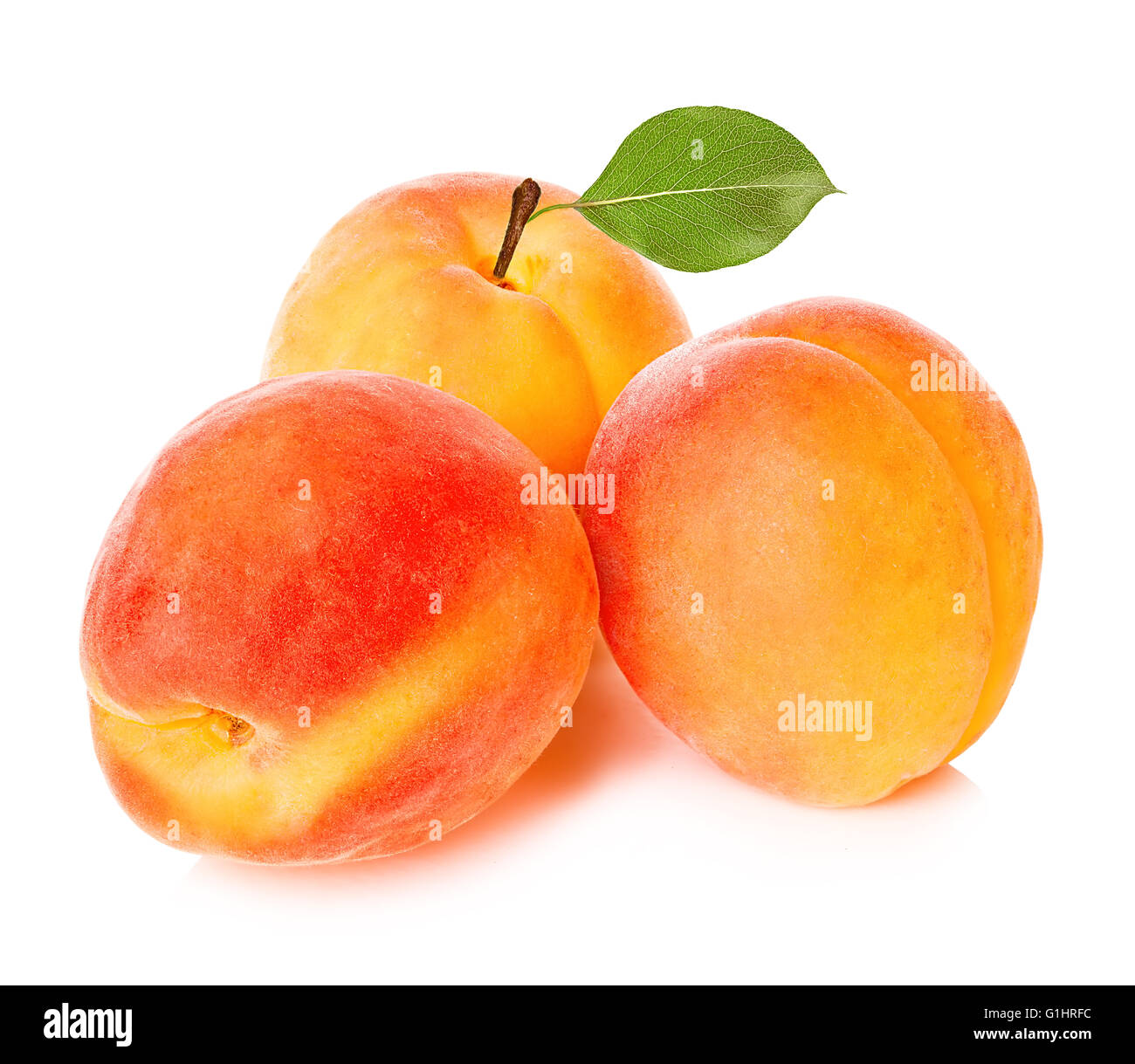 Ripe apricots with leaf isolated on a white background, with clipping ...