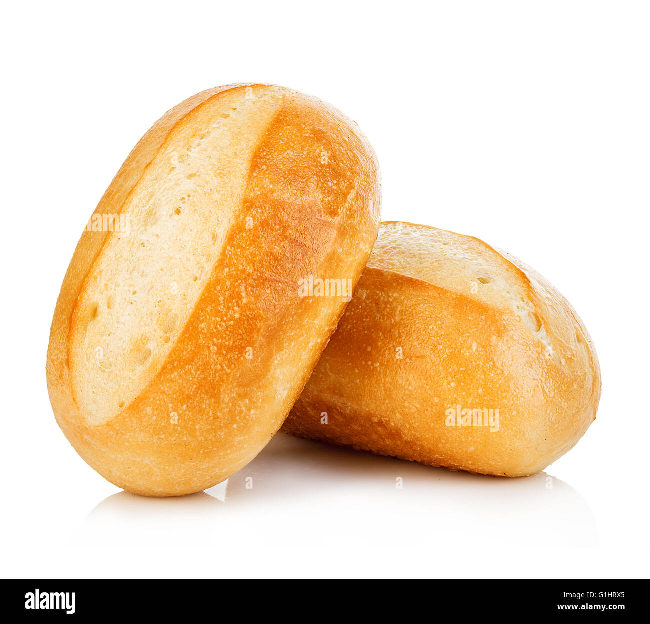 Two loaves of fresh homemade bread closeup isolated on a white