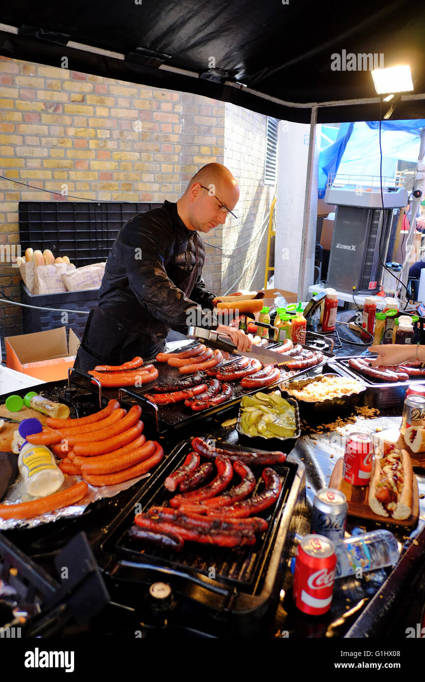 Mr Sausage hotdog seller at Brick Lane market in Shoreditch, London, England Stock Photo