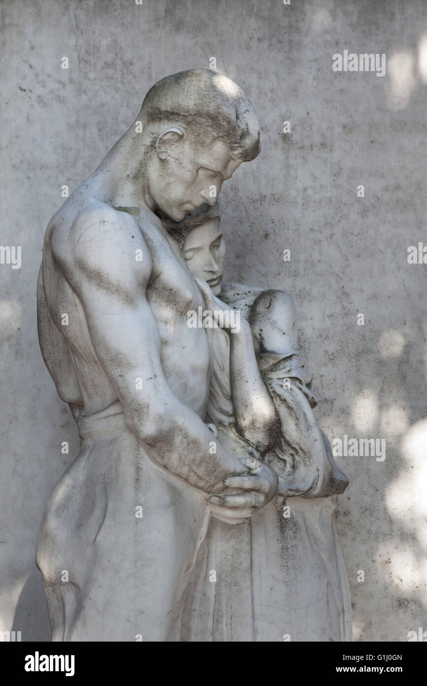 Marble statue on the tombstone of Pasquino Moraja at the Monumental Cemetery (Cimitero Monumentale di Milano) in Milan, Lombardy, Italy. Stock Photo