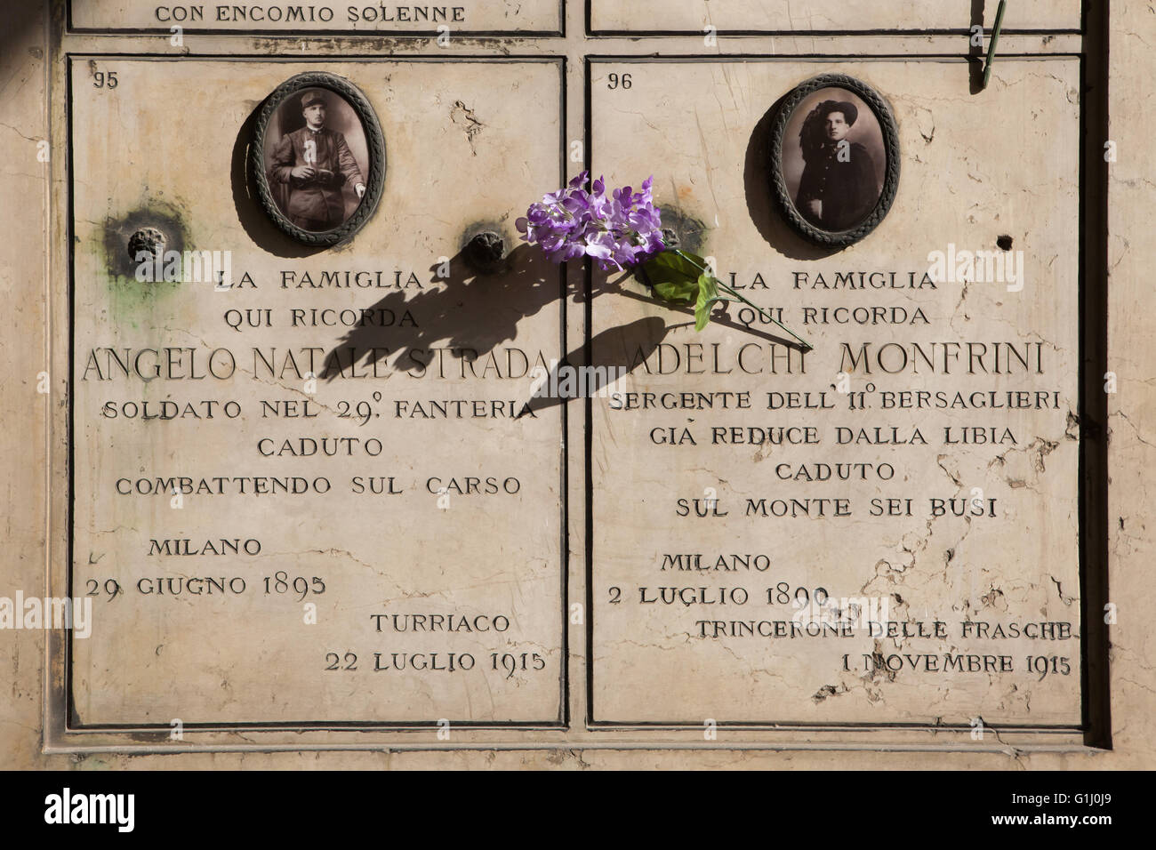 Commemorative plaques to Italian soldiers fallen during World War I at the Monumental Cemetery (Cimitero Monumentale di Milano) in Milan, Lombardy, Italy. Cenotaph to Angelo Natale Strada fallen at Turraco on July 22, 1915, and to Adelchi Monfrini fallen at Tricerone delle Frasche on November 1, 1915. Stock Photo