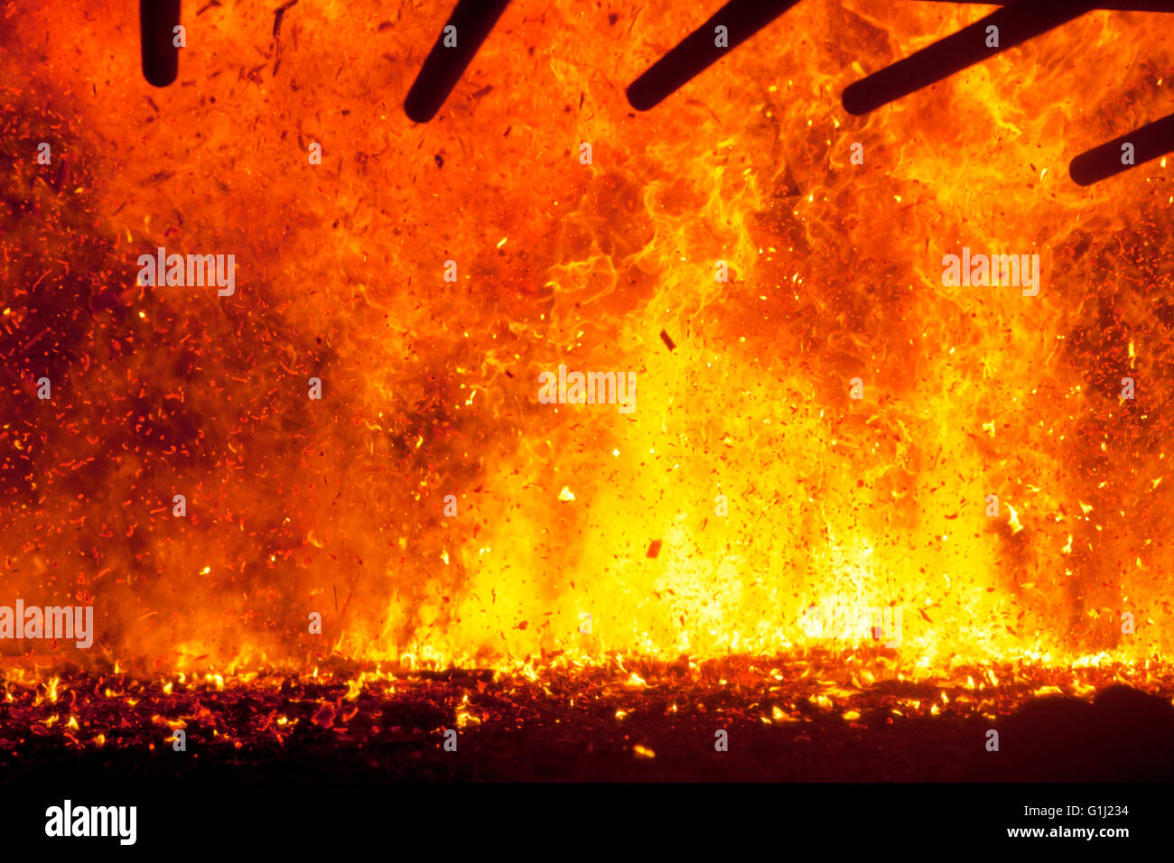 Woodchip burning at 970 degrees C in the combustion chamber of the Western Wood Energy Plant at Port Talbot, Wales. Stock Photo