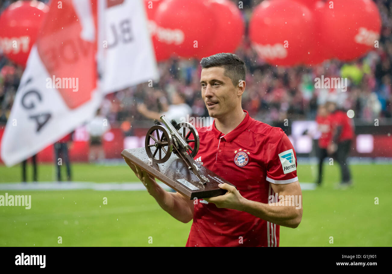 Munich's Robert Lewandowski receiving the Torjaegerkanone (lt. The top scorers canon) awarded to the highest scorer of the past season after the German Bundesliga between FC Bayern Munich and Hanover