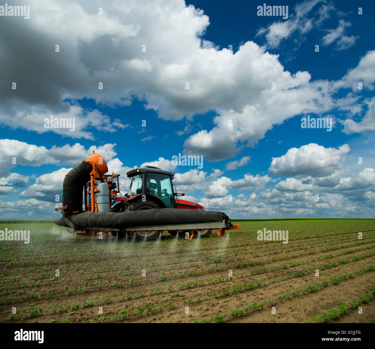 Tractor agriculture herbicides spraying hires stock photography and images Alamy