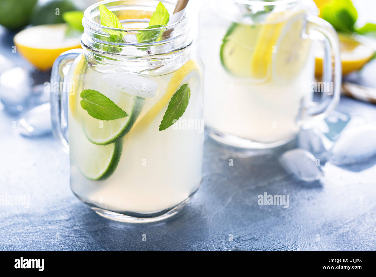 Fresh citrus lemonade in mason jars Stock Photo