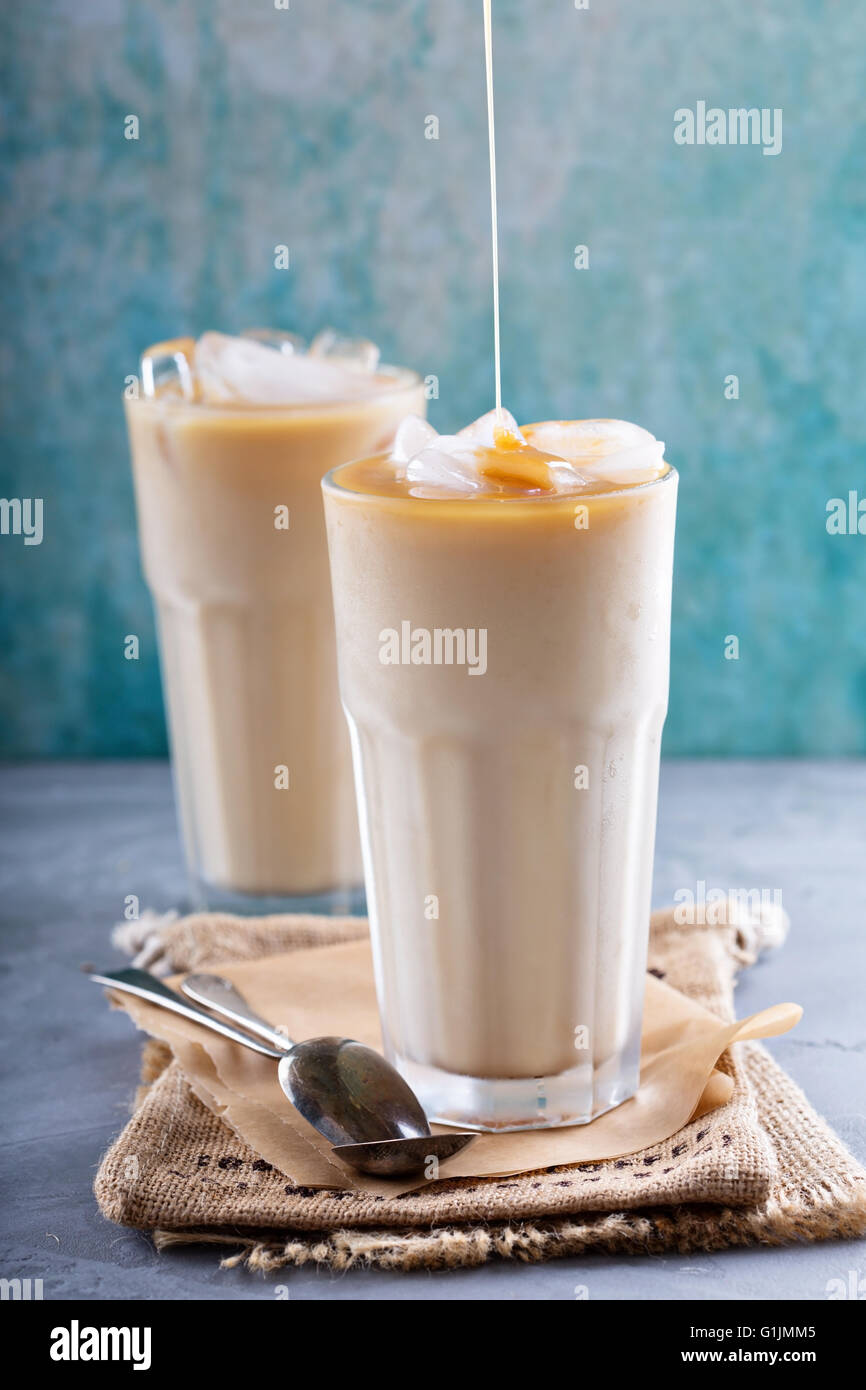 Iced coffee with milk in tall glasses Stock Photo Alamy