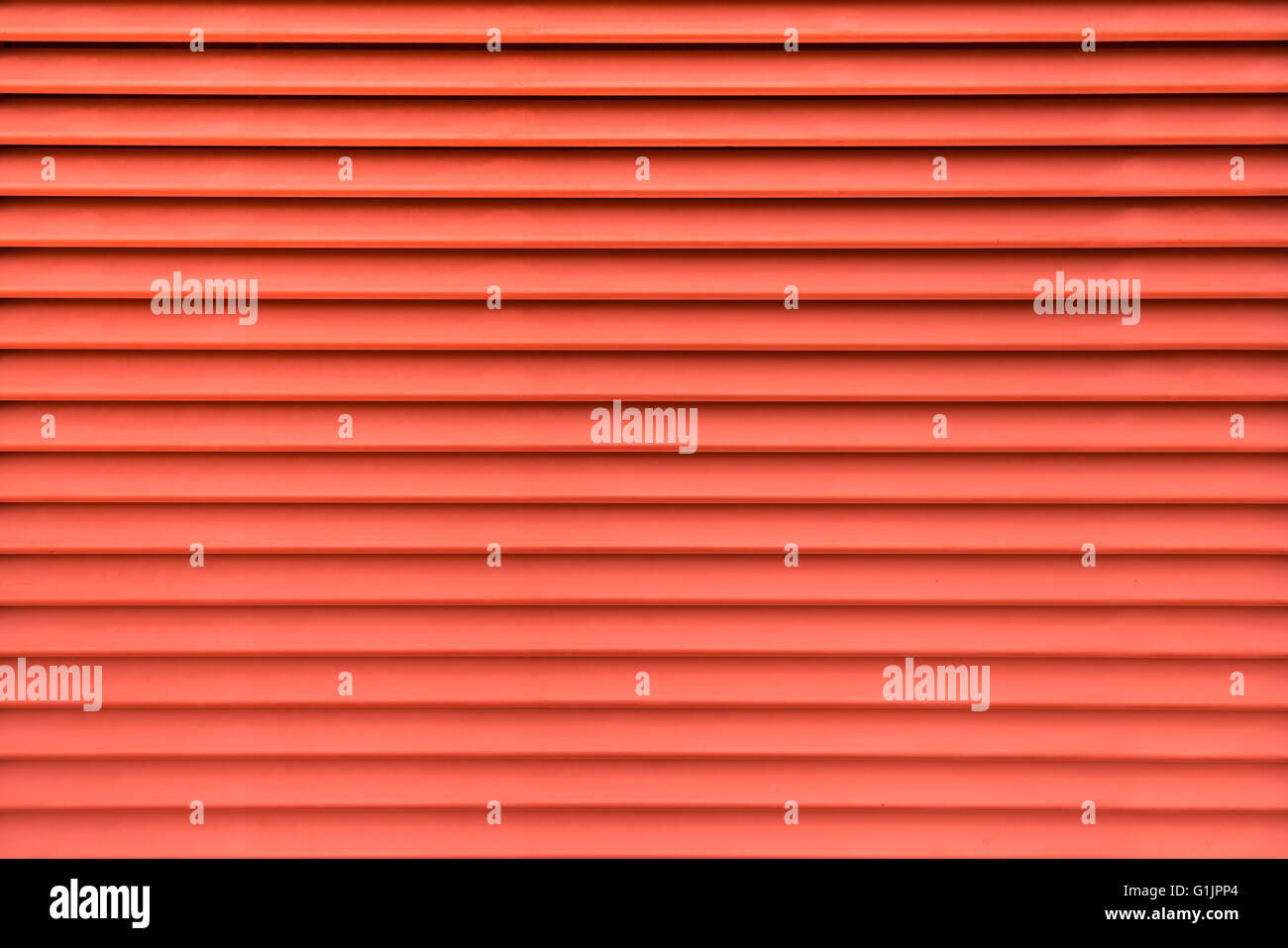 Red abstract background of air vent in horizontal pattern Stock Photo