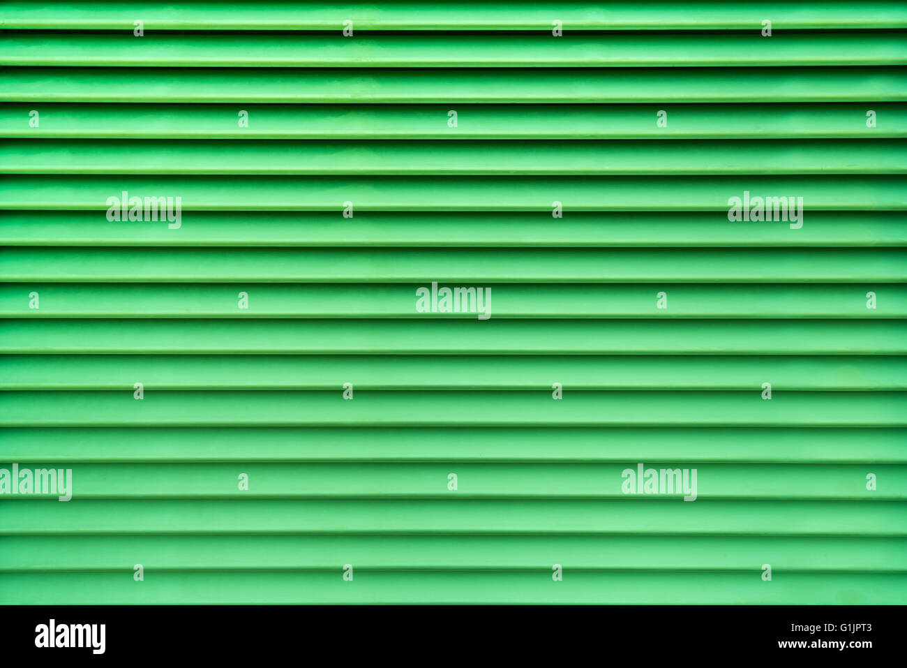 Green abstract background of air vent in horizontal pattern Stock Photo