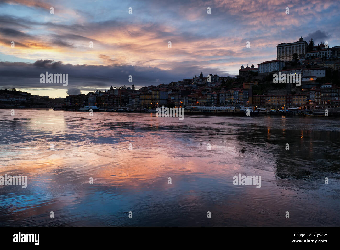 Twilight reflections on River Douro in Porto, Portugal, city skyline Stock Photo