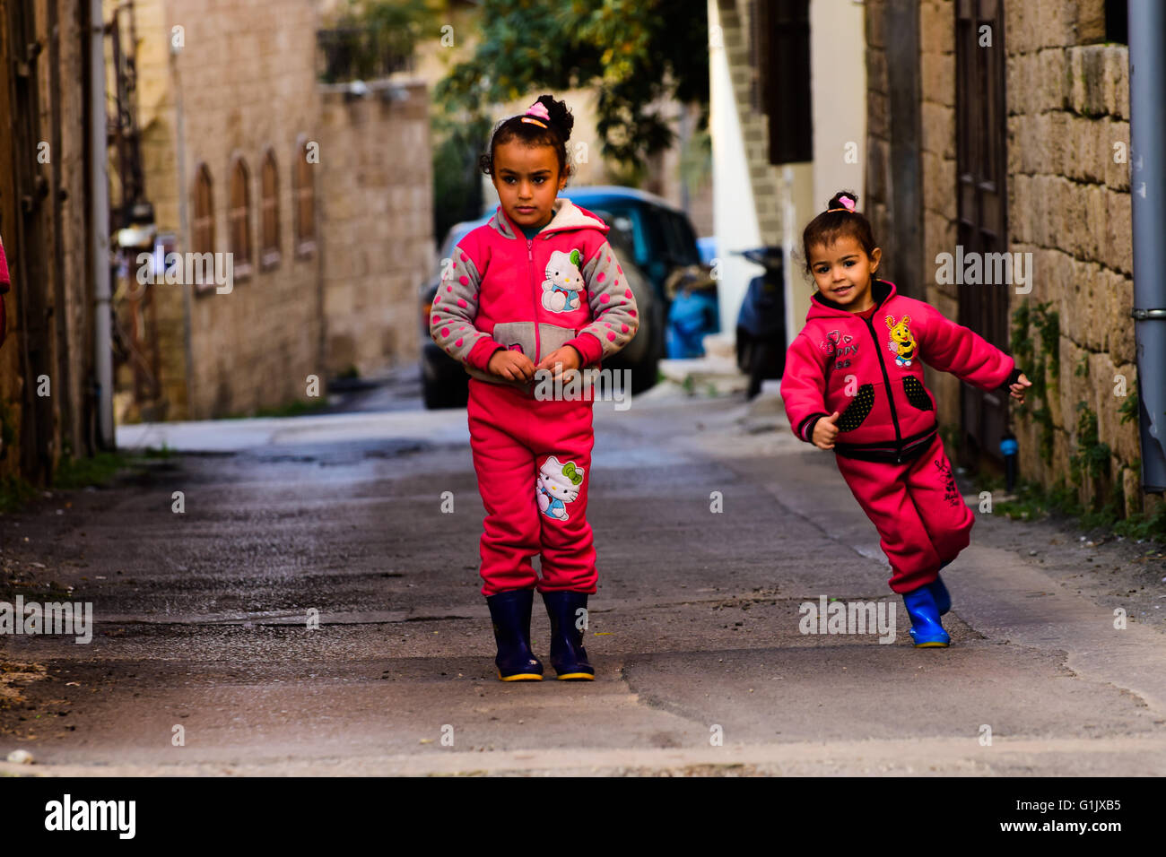 kids at play, syrian refugees at lebanon, because happines does not  know any limits! Stock Photo