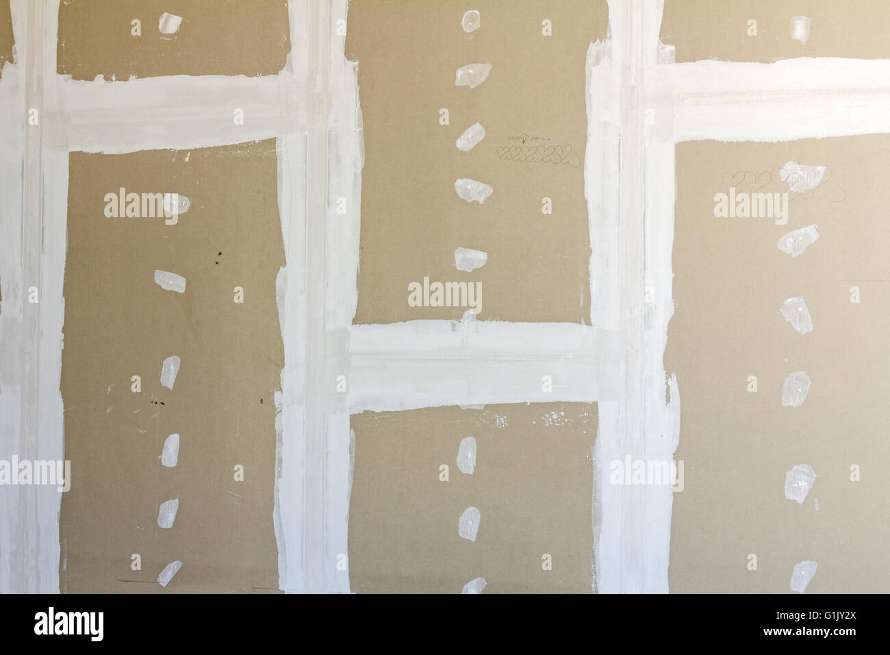 Front view of gypsum wall with joints at building site Stock Photo Alamy