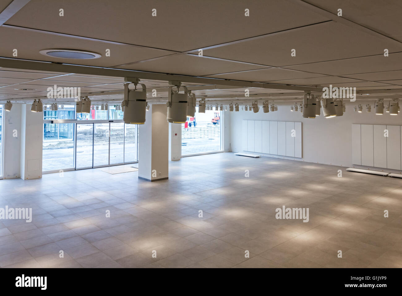 View on large showroom in a modern business centre with ceiling light. Stock Photo
