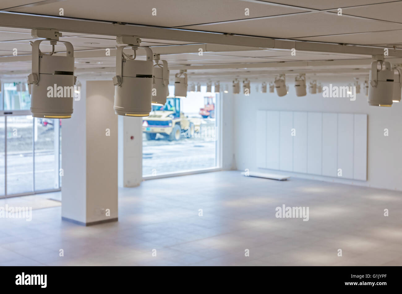 View on large showroom in a modern business centre with ceiling light. Stock Photo