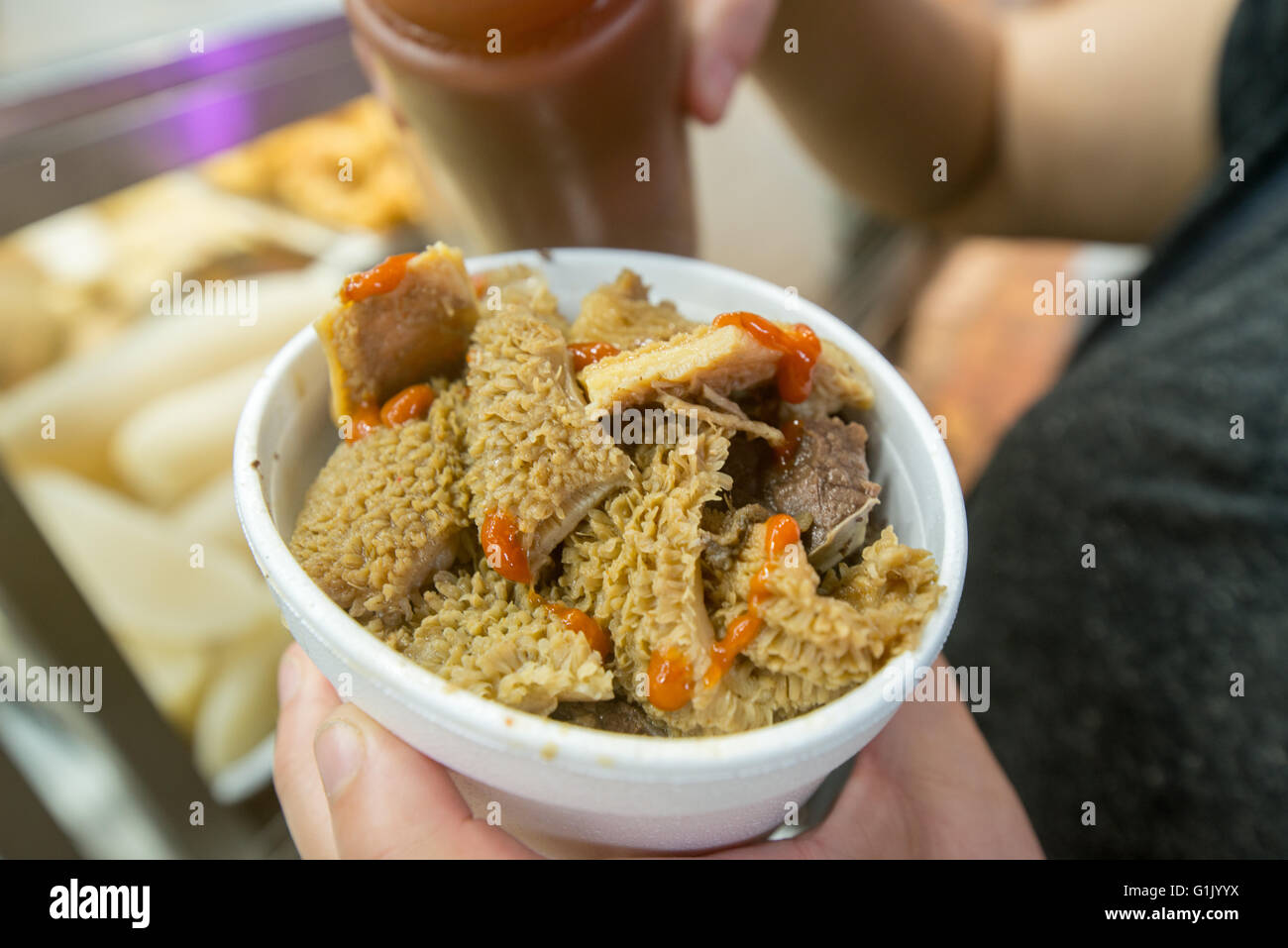 Cooked Chinese style tripe in takeaway cup Stock Photo