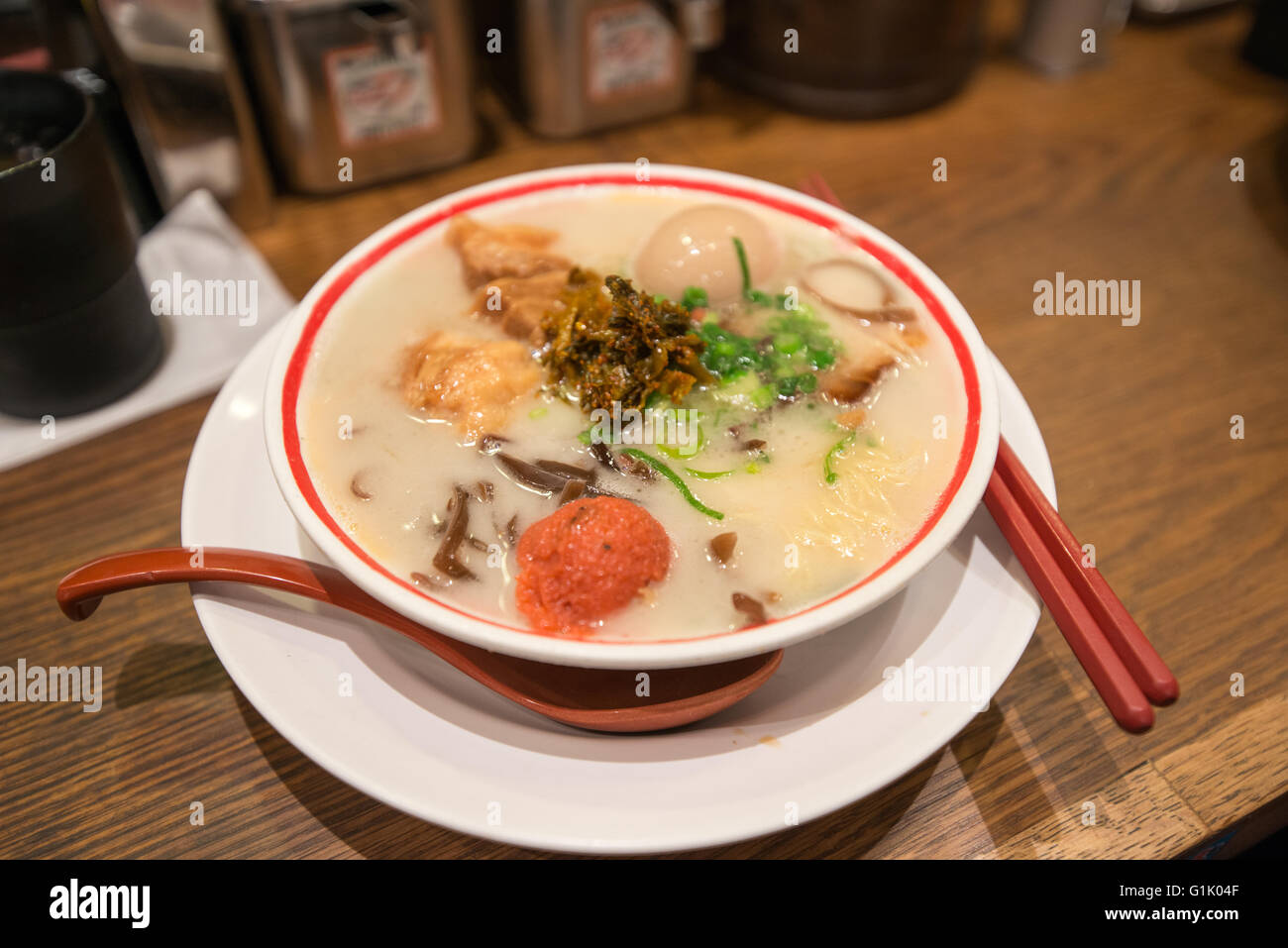 A bowl of Japanese styled soup on table Stock Photo