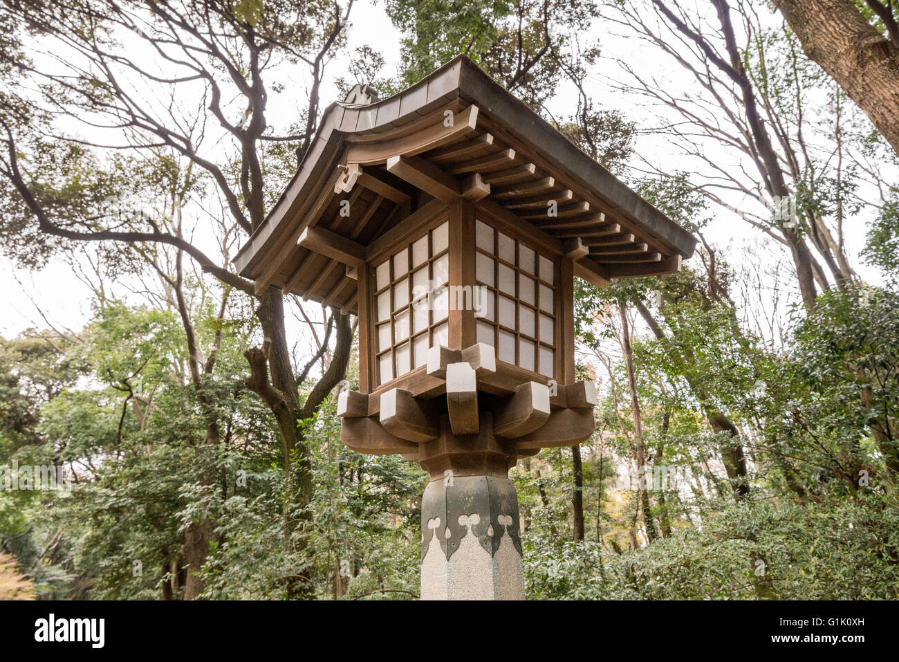 Large Japanese garden lantern at dusk Stock Photo
