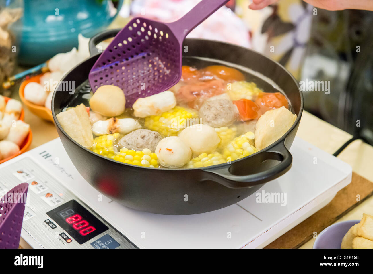 traditional style of hot pot cooking in Asian countries Stock Photo