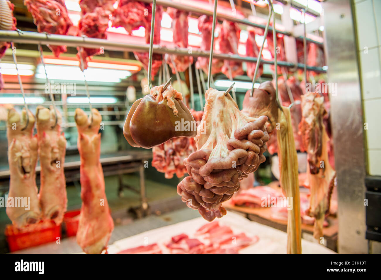 Fresh Meat Hang on Spike in Asain Market. Stock Photo - Image of loin,  roast: 67932000