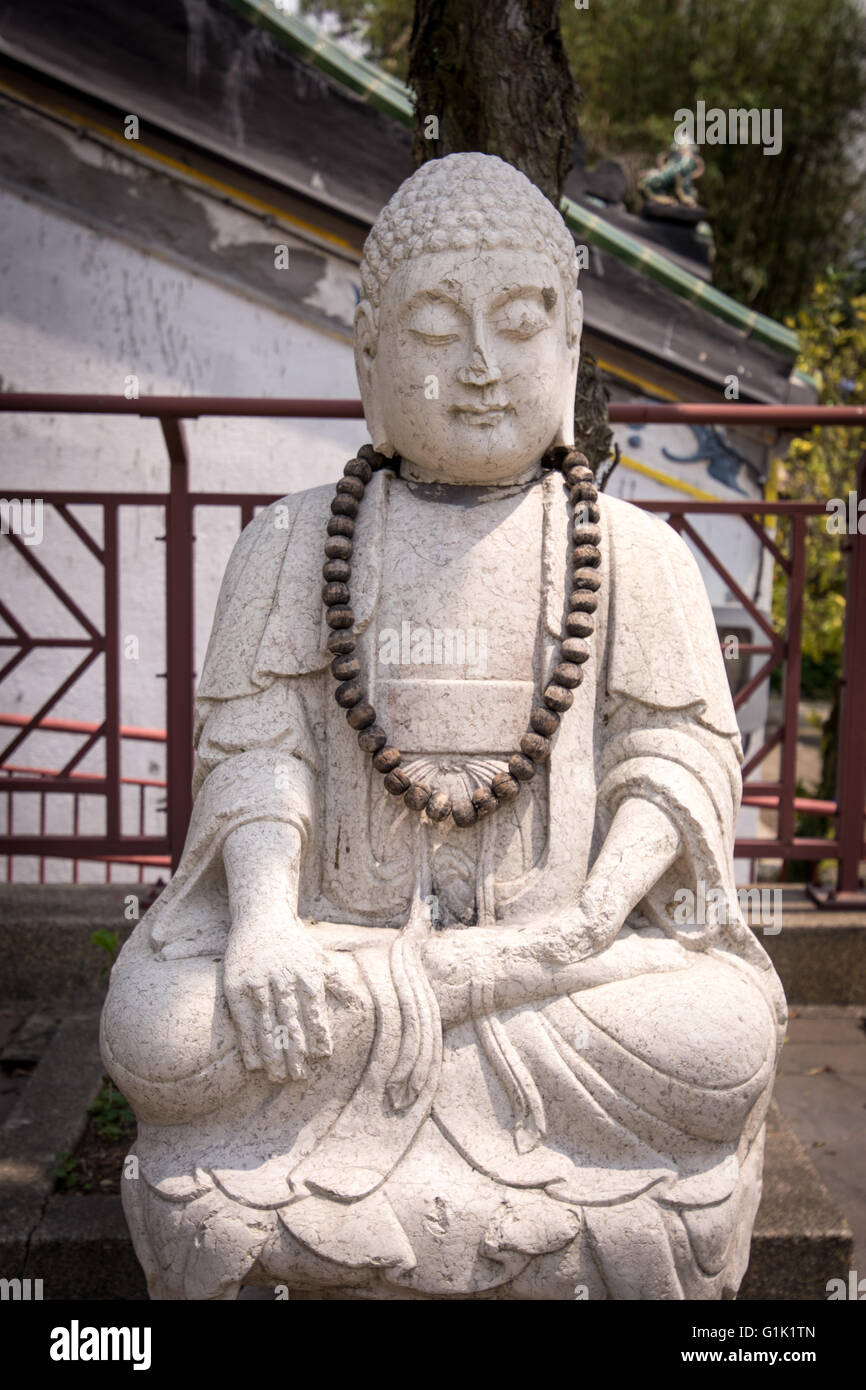 Chinese statue of worship Stock Photo Alamy